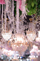 A refined gala scene with guests in elegant attire, bathed in warm, golden light.