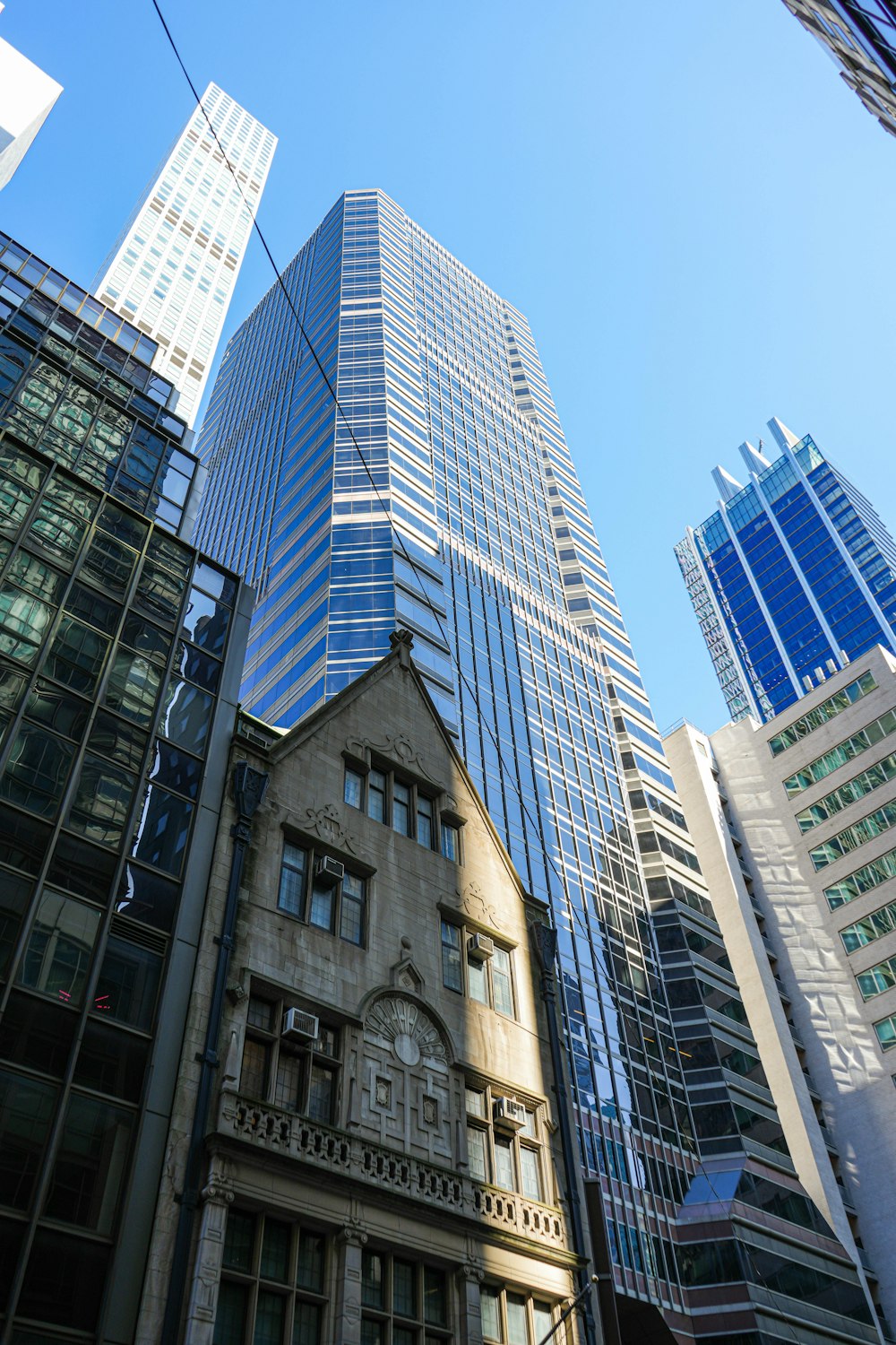 a group of tall buildings next to each other