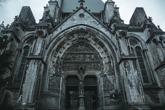an old gothic church with a clock tower