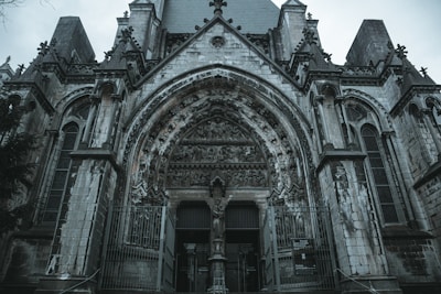 an old gothic church with a clock tower
