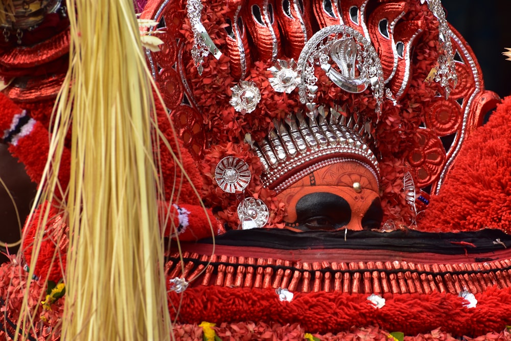 a close up of a person wearing a costume