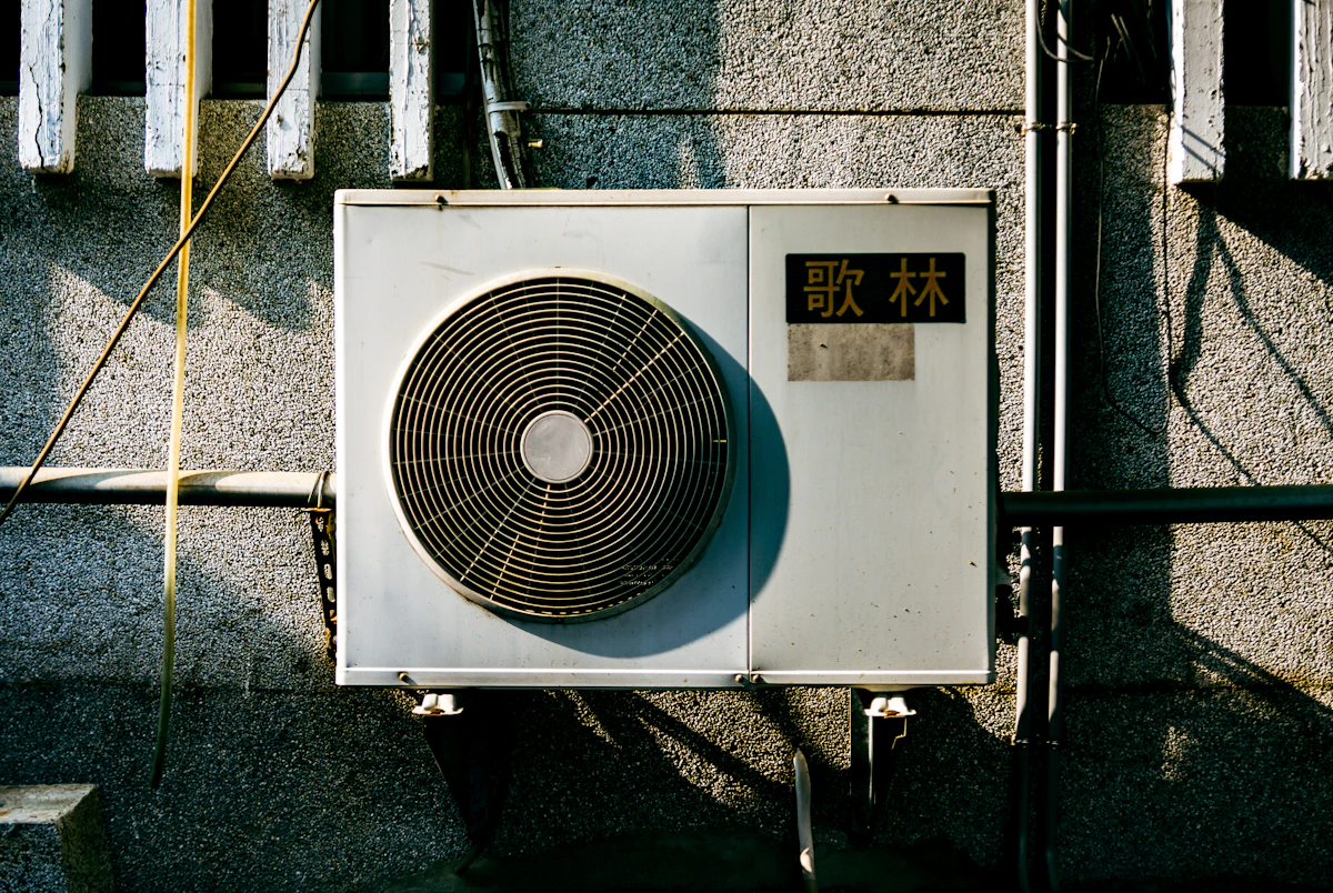 wall mounted AC on the side of a building