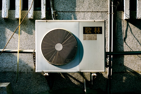 Wall-mounted air conditioner on a building