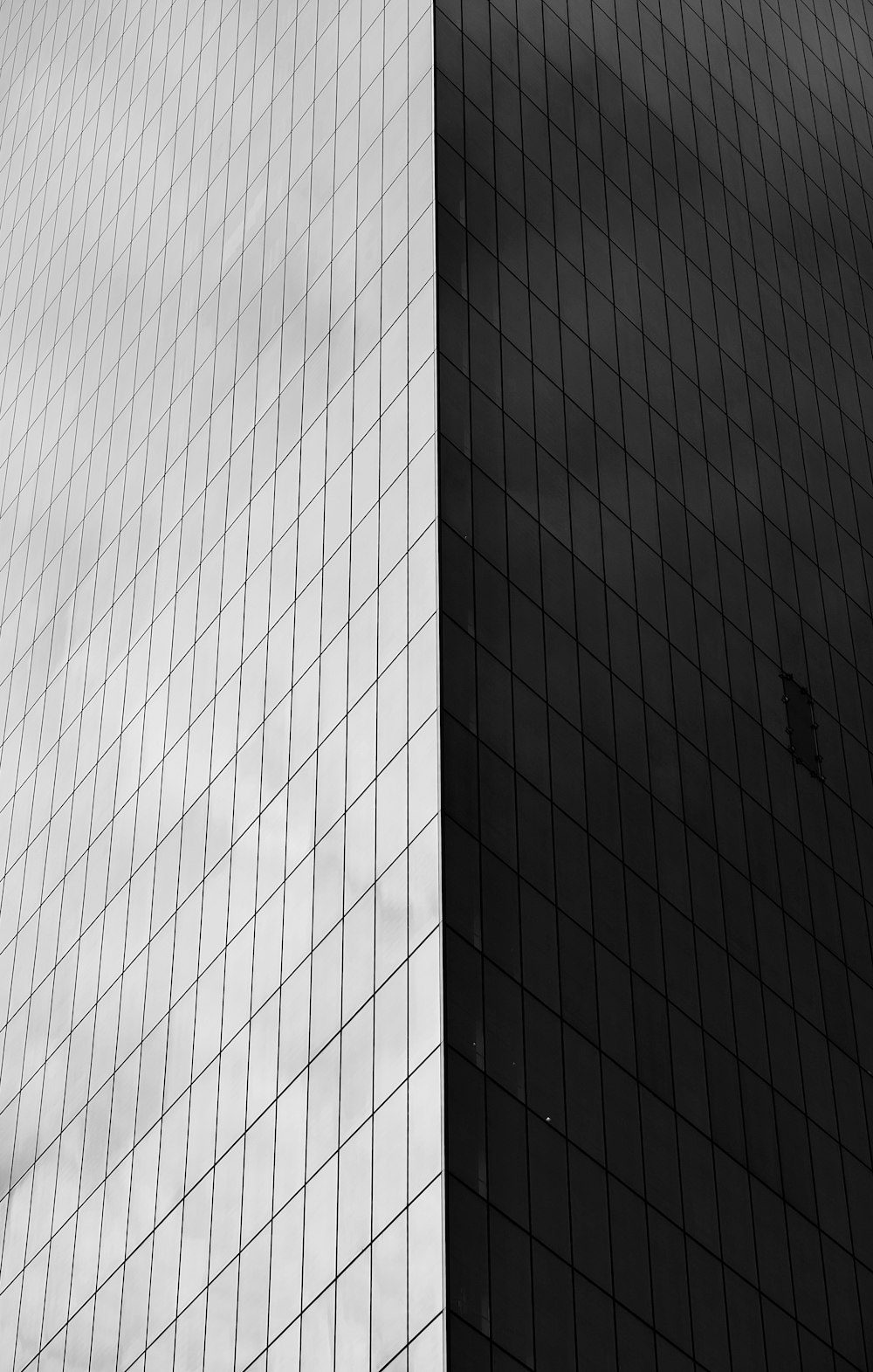 a black and white photo of a tall building