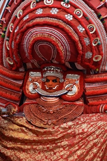 a statue of a woman in a red dress