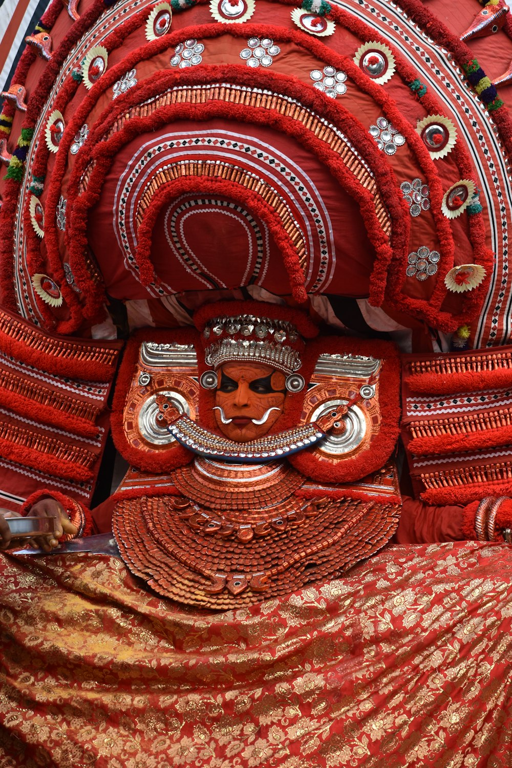 a statue of a woman in a red dress