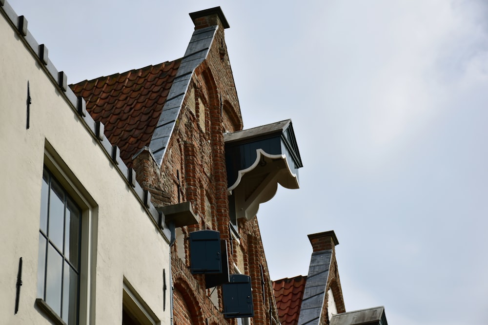 a tall building with a clock on the side of it