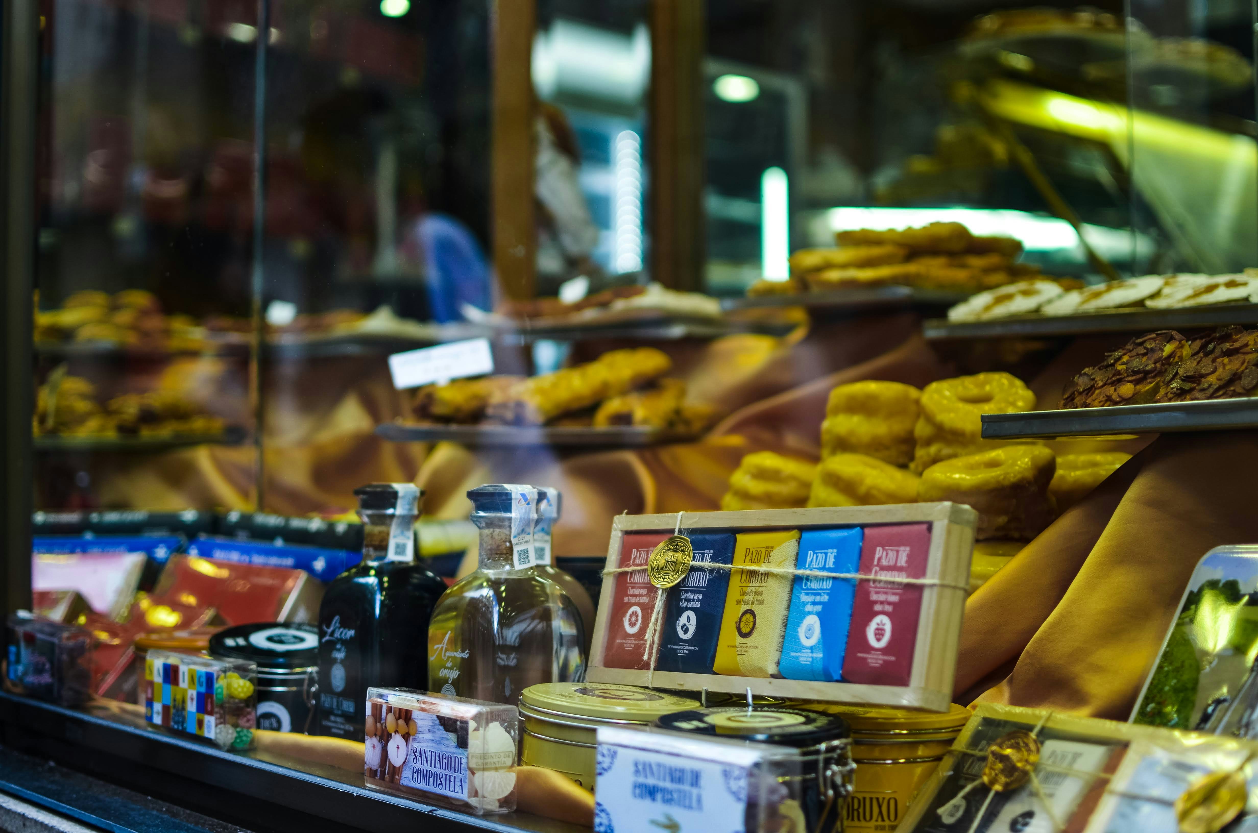 a display case filled with lots of different types of donuts