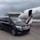 Comfortable Mercedes van parked at Montenegro airport with passengers boarding