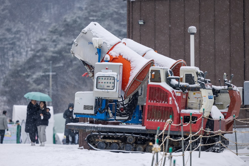 a snow plow is parked on the side of the road