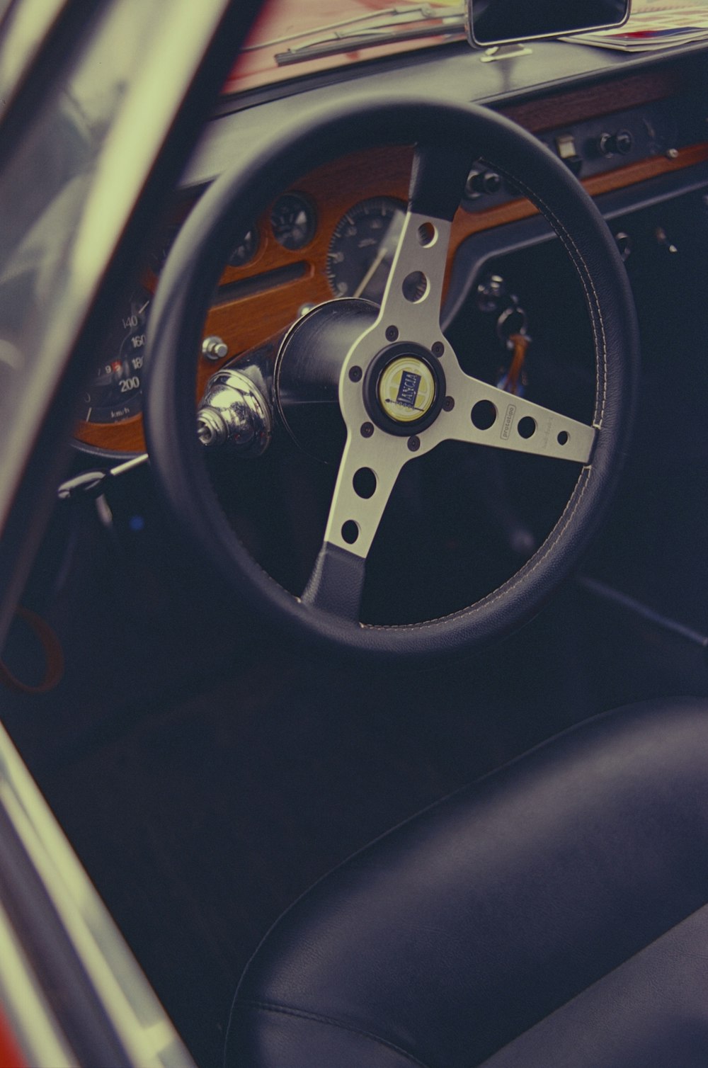 a steering wheel and dashboard of a car