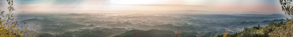 a picture of a mountain range with a sky background