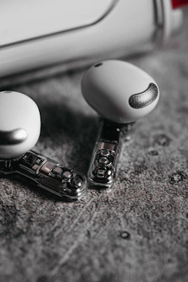 Wireless earbuds translating languages in real-time during a conversation.