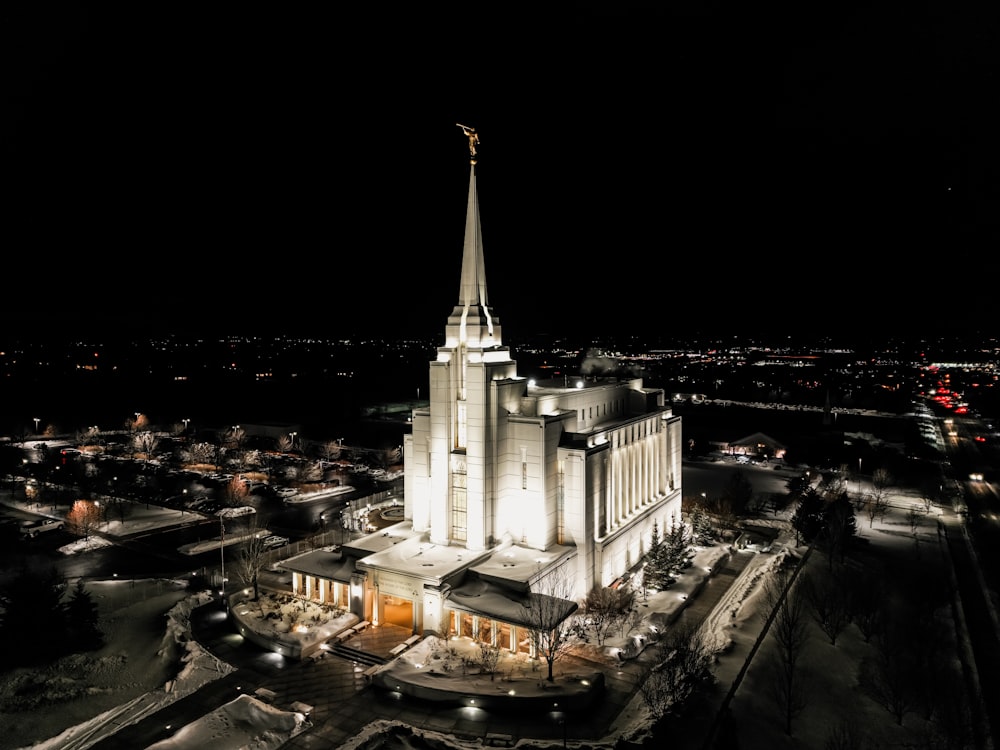 an aerial view of a church at night