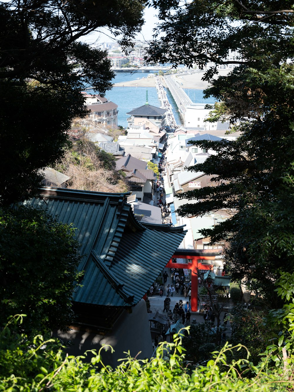 a view of a city with a bridge in the background