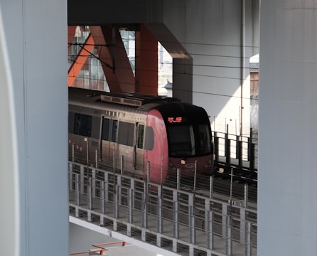 A modern train running on a newly installed rail signaling system in Dubai.