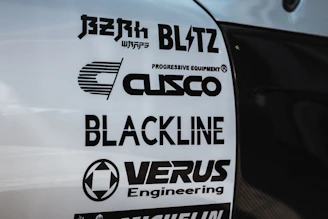 Close-up view of Cummins, Mitsubishi, Perkins, and Volvo logos arranged neatly in a grid.