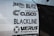 Multiple brand logos are displayed on a white surface, featuring various automotive and engineering companies such as Blitz, Cusco, Blackline, and Verus Engineering. The text is printed in bold black font, each with distinctive logo designs.