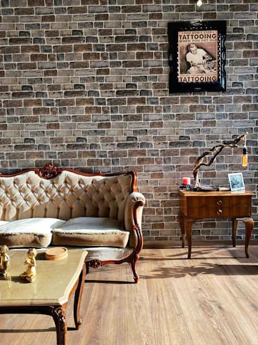 A cozy living room wall adorned with elegant, premium matte finish wall stickers from cryptofeno.