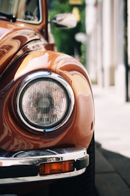 a close up of a car parked on the side of the road
