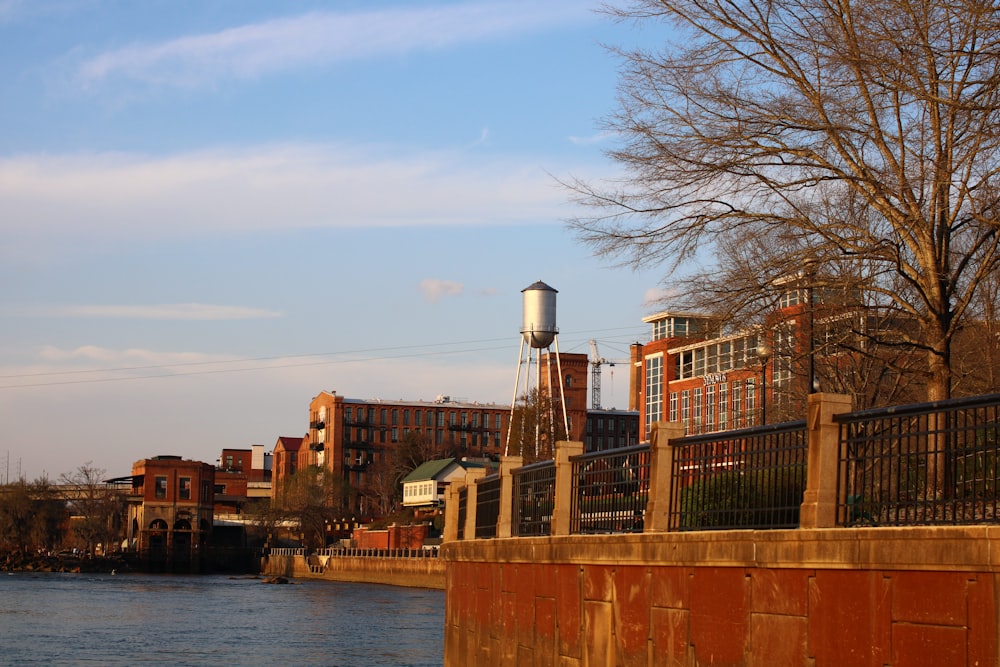 a large body of water next to a city