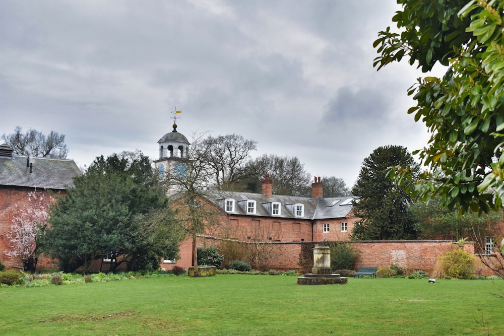 a large brick building with a clock tower