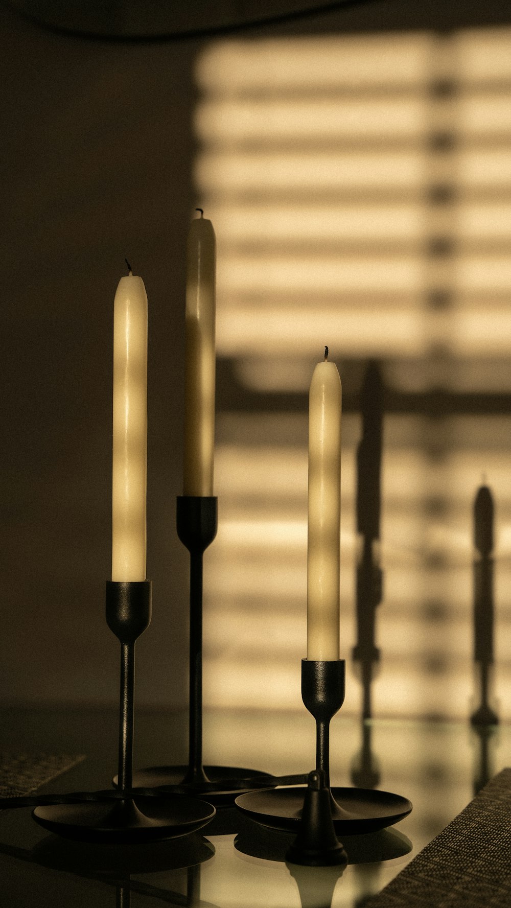 a couple of candles that are on a table