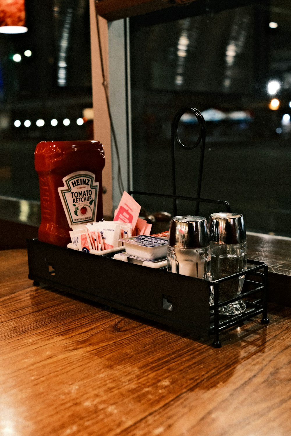 a tray with condiments and condiments on a table