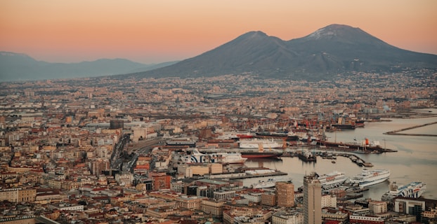 a view of a city with a mountain in the background