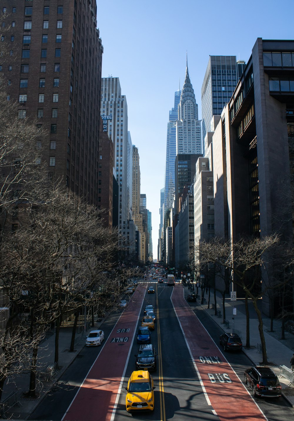 a city street lined with tall buildings