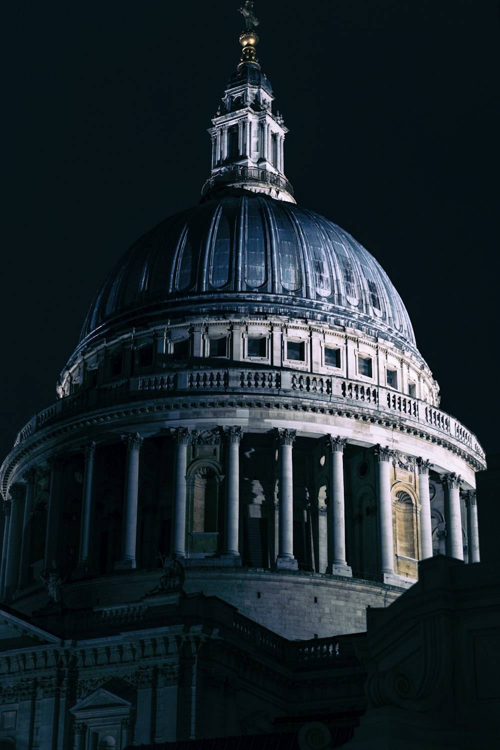 the dome of a building lit up at night