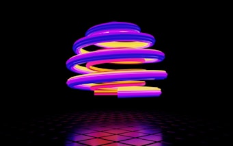 a purple and yellow object floating in the air