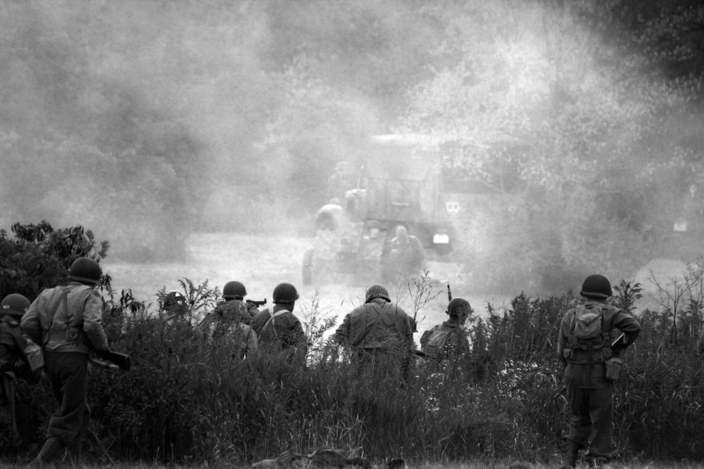 a black and white photo of a group of soldiers