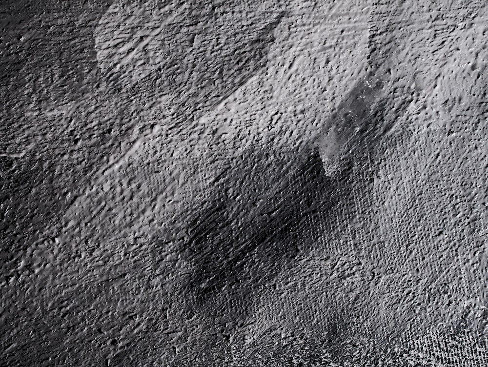 a black and white photo of a rock formation