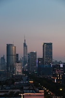 A city skyline at dusk, showcasing business growth.