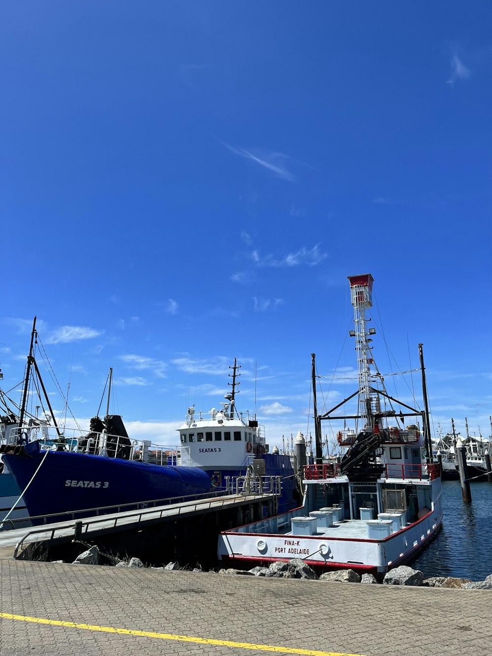 a couple of boats that are sitting in the water