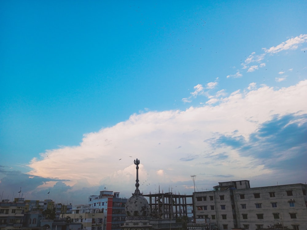 a tall clock tower towering over a city