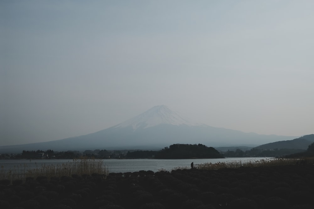 a mountain with a lake in front of it