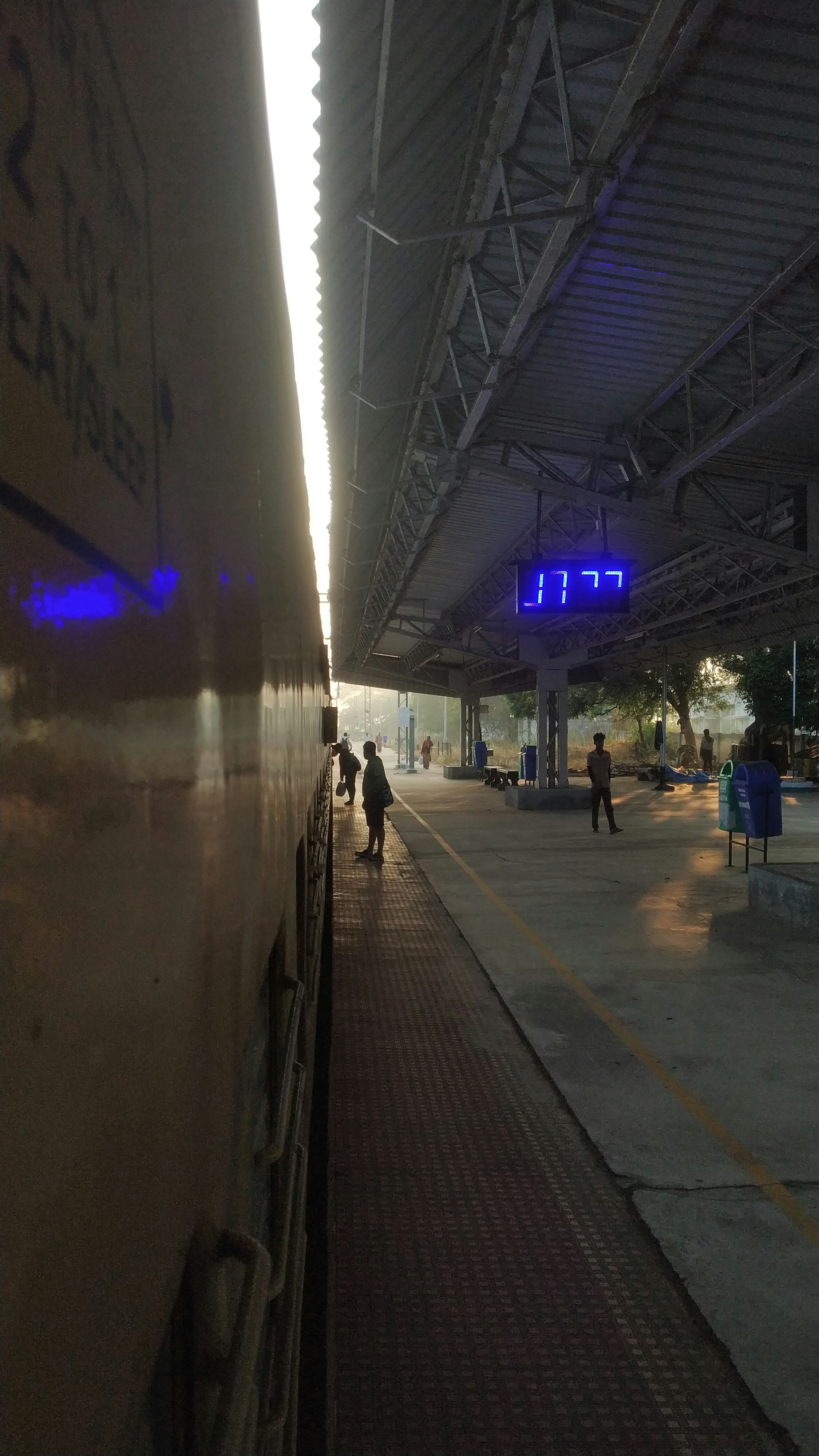 Delayed train at station causing passenger frustration