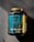 A large black container of ISO TOUCH pure isolate protein with a black and teal label, featuring bold text and nutritional information. The label includes details such as '100% Ultra-Filtrated', 'ISO PURE ISOLATE PROTEIN', and quantities of protein, BCAA, and glutamine. The container has a yellow cap and is placed on a dark textured surface with a striped pattern.