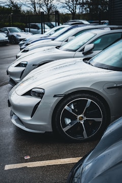 A row of shiny cars ready for pickup after washing.