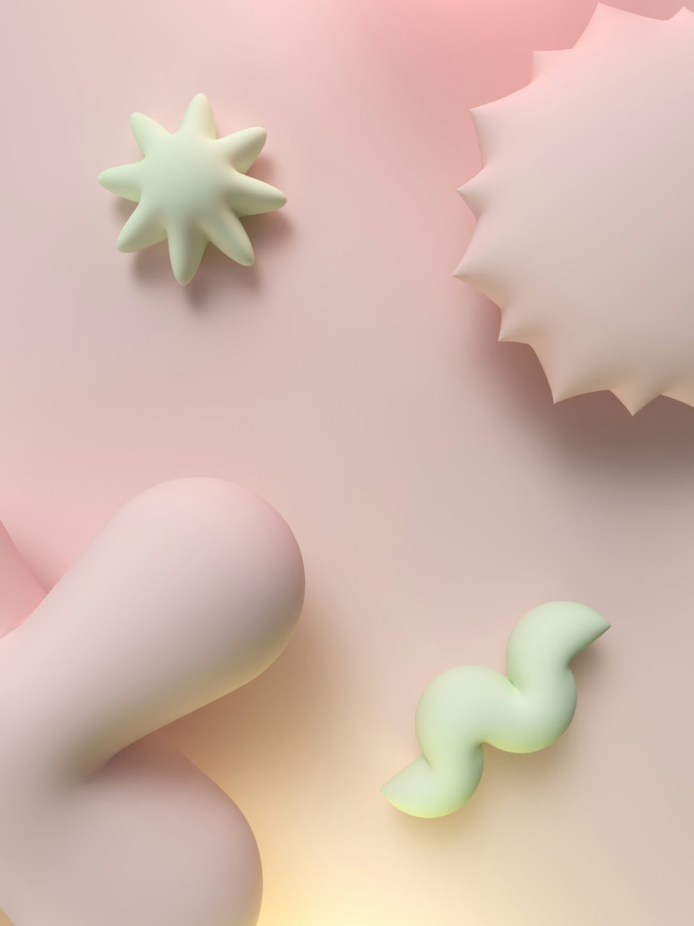 a close up of a pink and green object