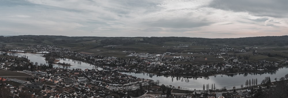 a bird's eye view of a town and a river