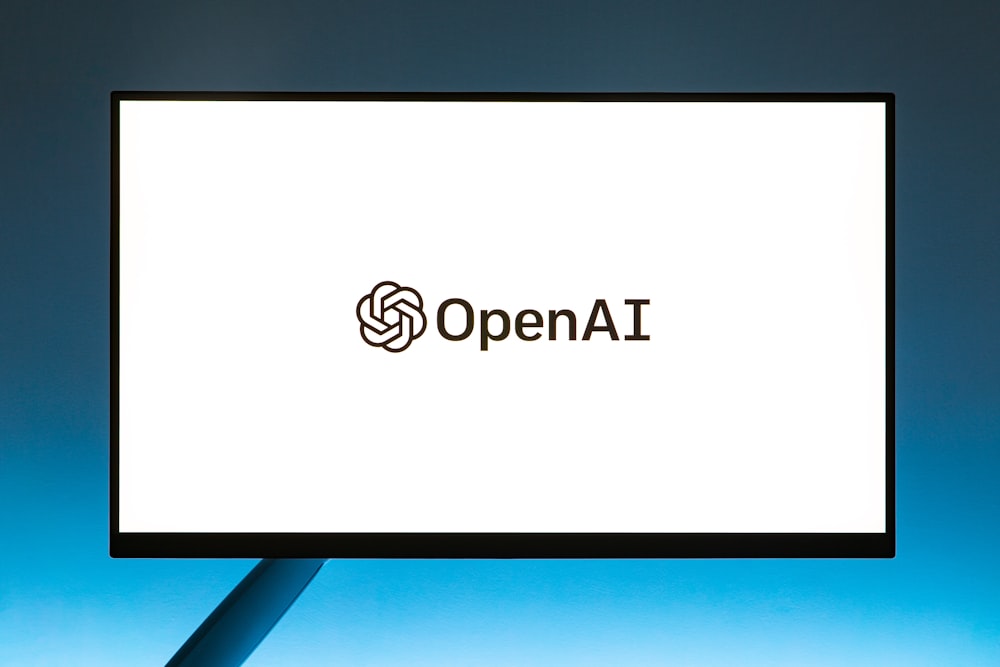 Un écran d’ordinateur avec le logo Open AI