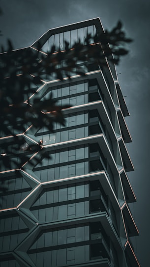 a tall building with a clock on the top of it