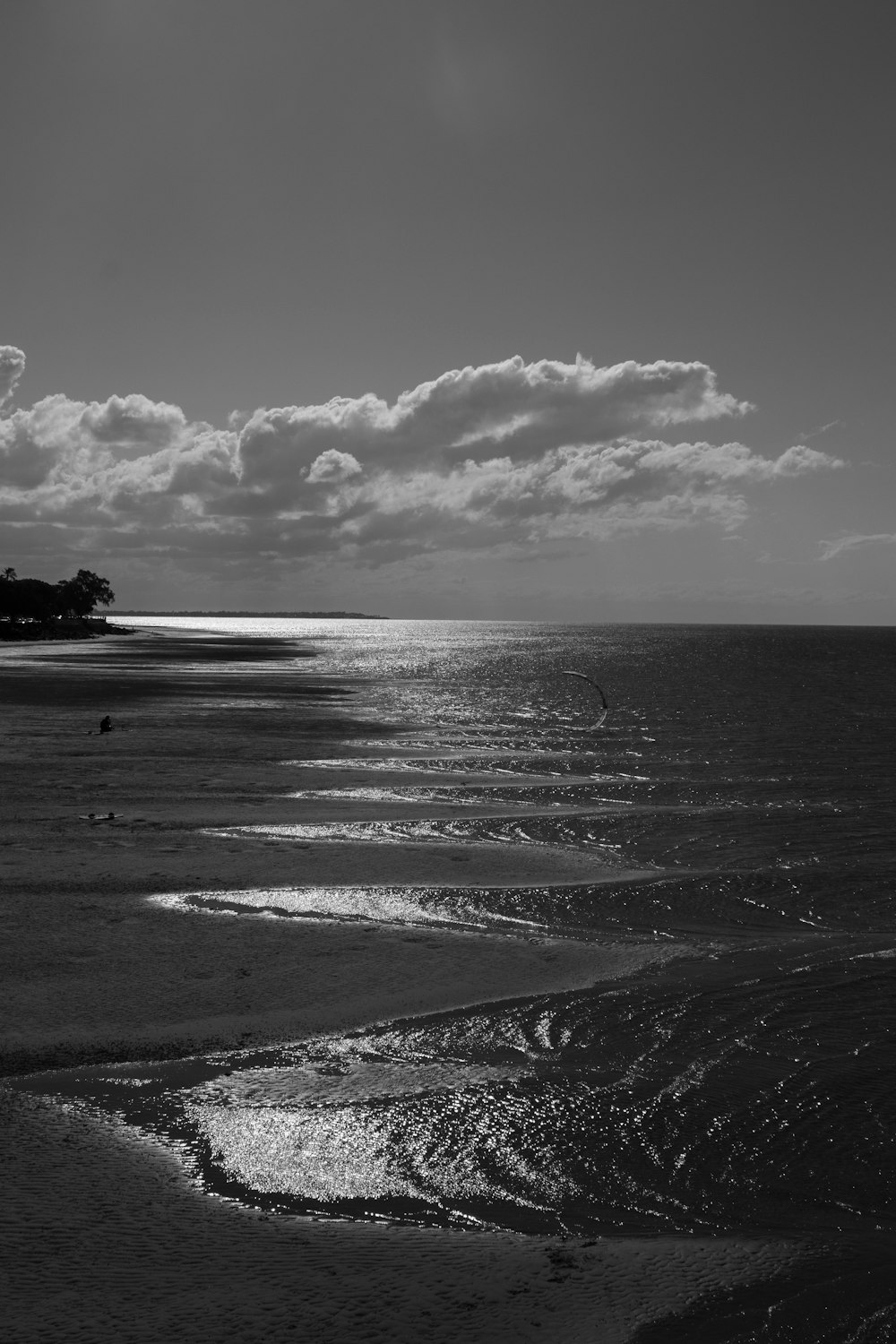 a black and white photo of the ocean