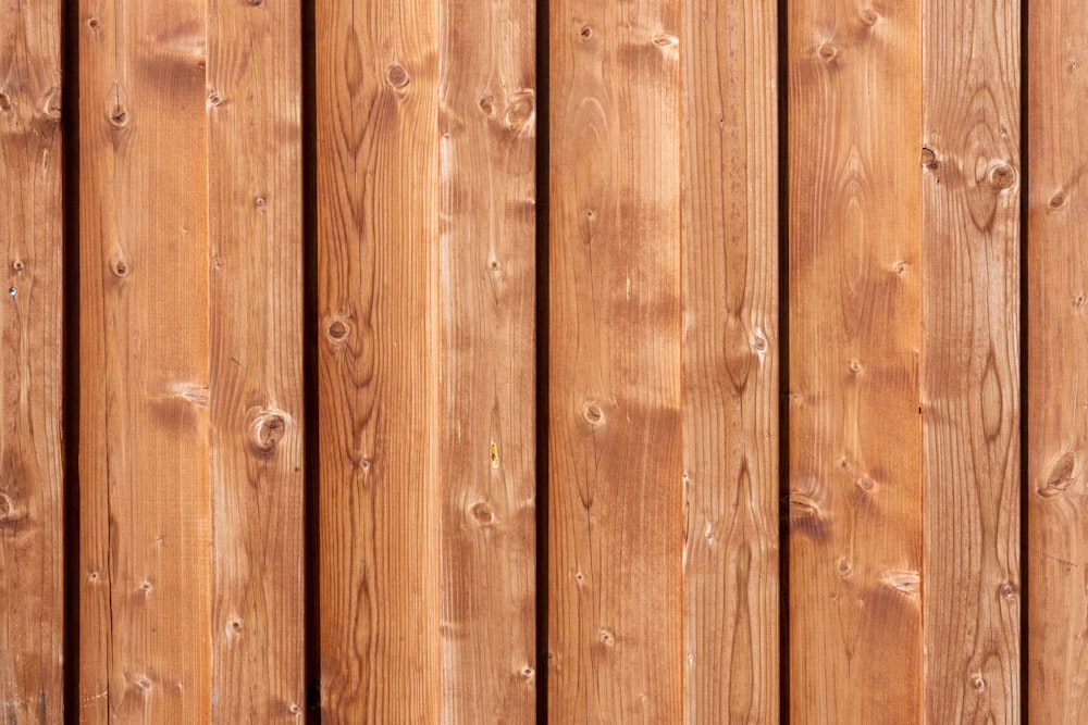 a close up view of a wooden fence