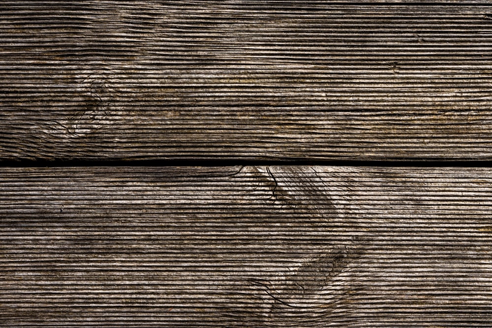 a close up view of a wooden surface