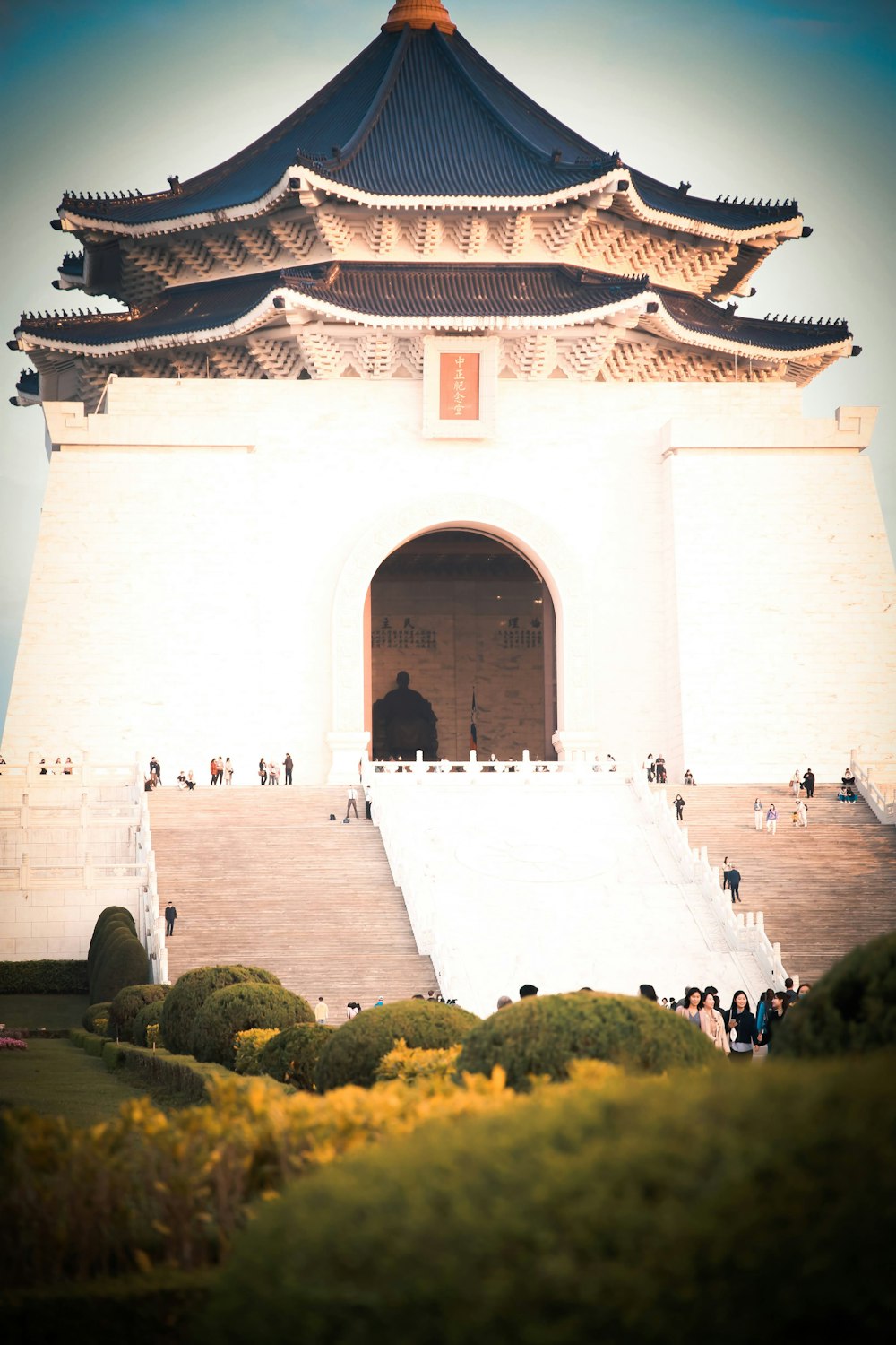 a large white building with a tall tower on top of it