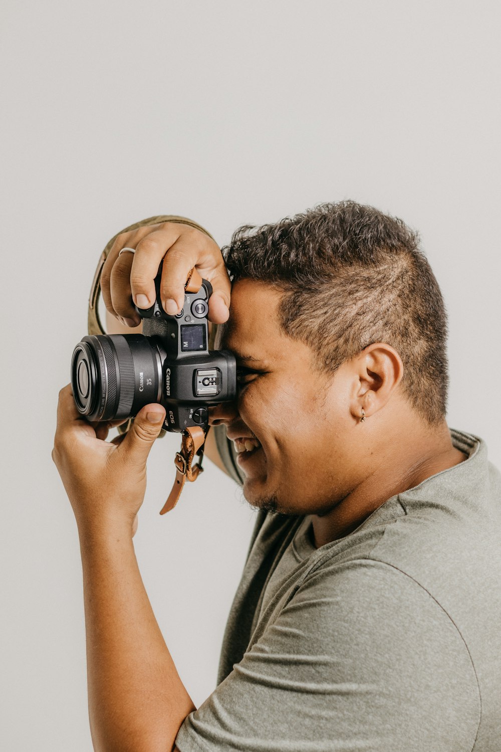 a man taking a picture with a camera